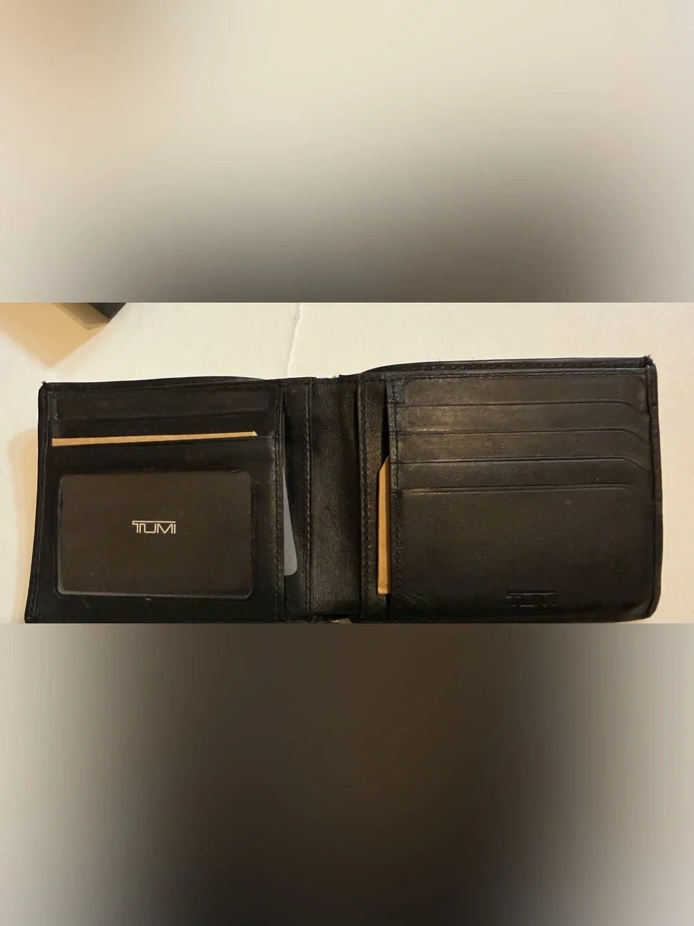 Men’s Tumi black bifold wallet, good condition